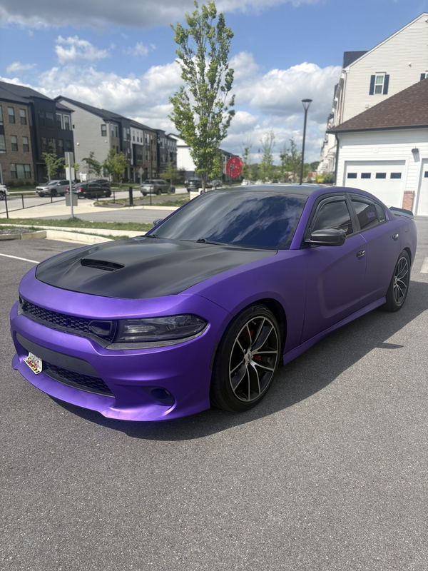 Dodge Charger wrapped in matte purple with a satin black hood